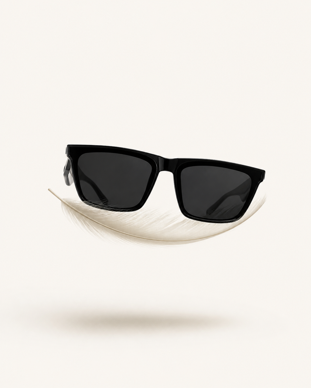 The Carter sunglasses balanced on a feather — 25 grams