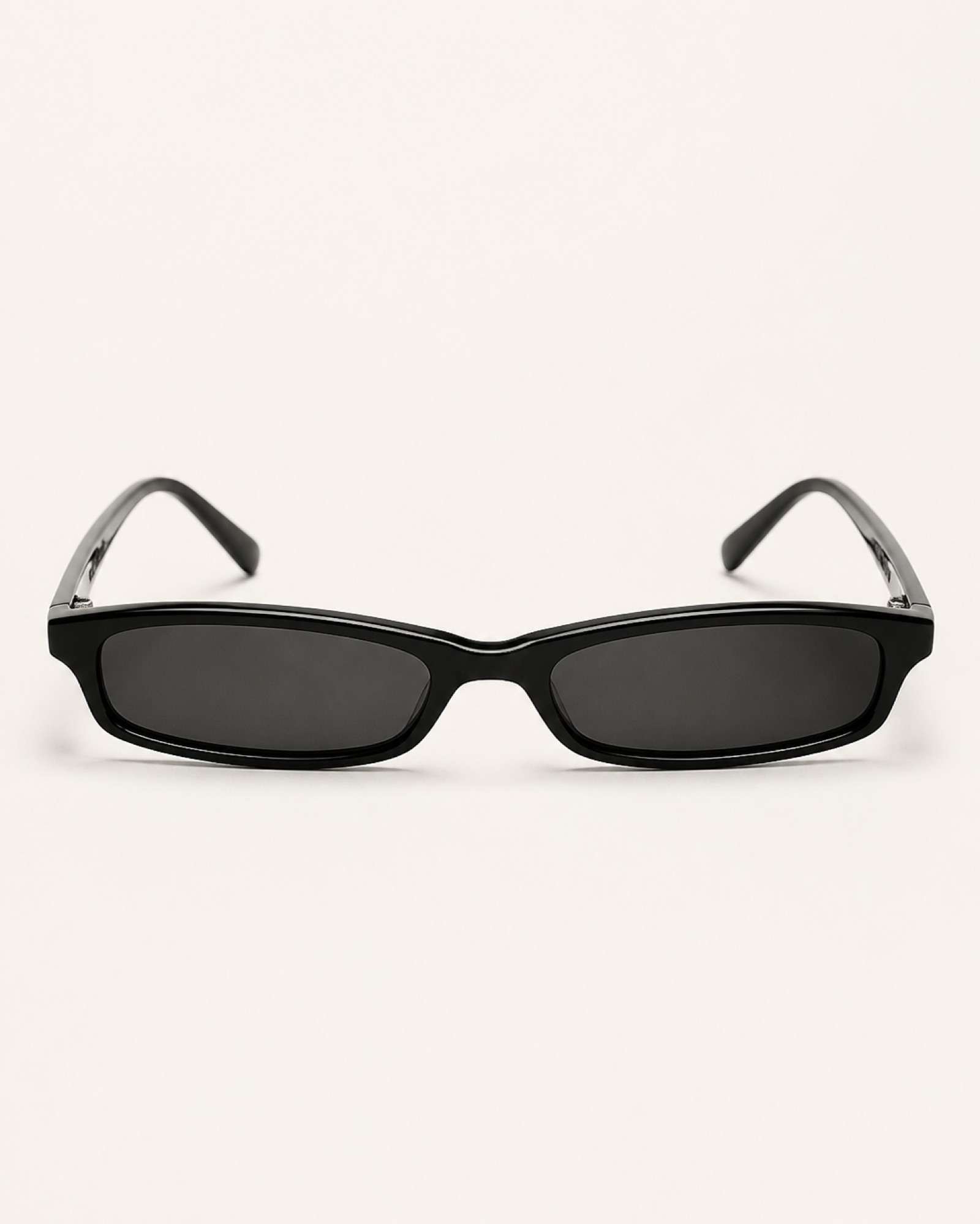 The Charlotte slim rectangle sunglasses on off-white background